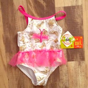 Dragon Fly swim suit never worn